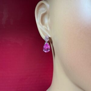 FAS Sterling Silver earrings with a pink and clear stone. 3/4 inch long